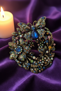 Broche baroque bleue multicolore velours bougie